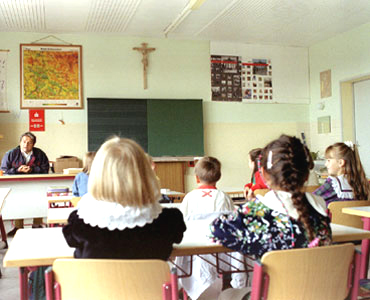 kryziai mokyklose